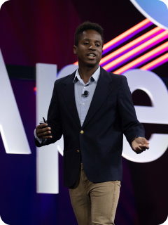 Person speaking at a conference